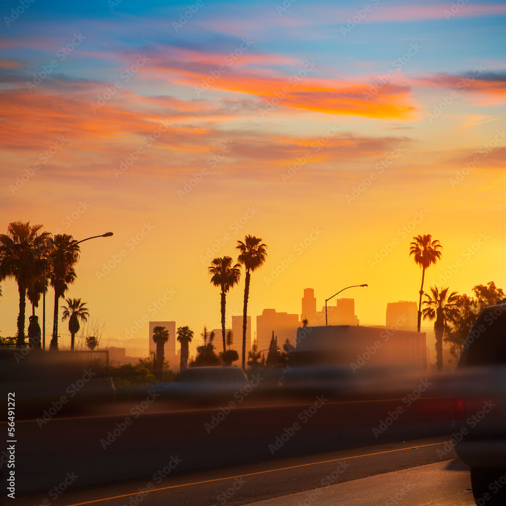 Naklejka premium LA Los Angeles sunset skyline with traffic California