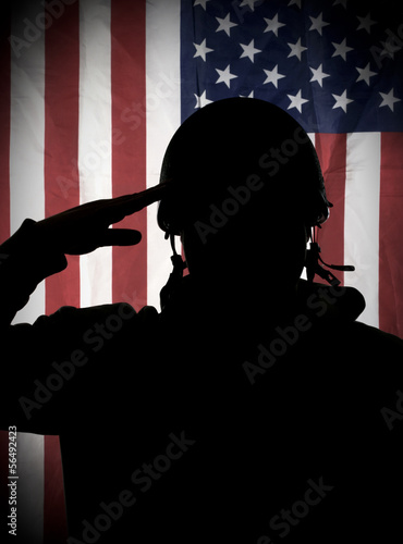 American (USA) soldier saluting to USA flag