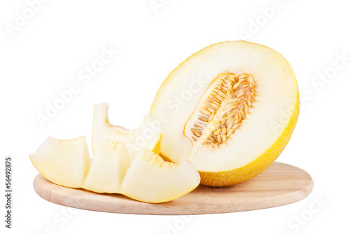 sweet melon on wooden carving board