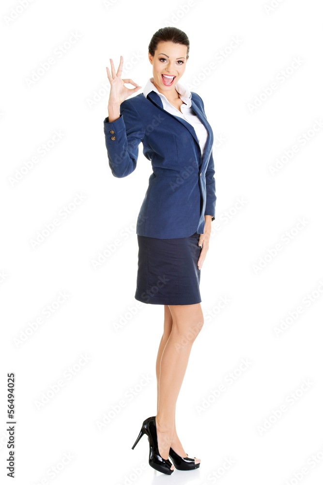 Perfect - business woman showing OK hand sign. Perfect - business woman showing OK hand sign.