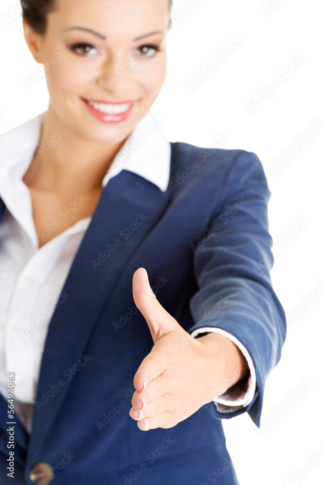 A beautiful businesswoman about to shake hands. A beautiful businesswoman about to shake hands.
