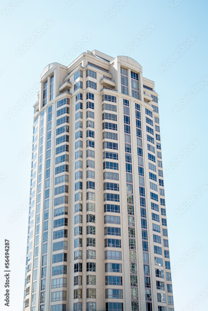 Modern Condo Tower on Blue