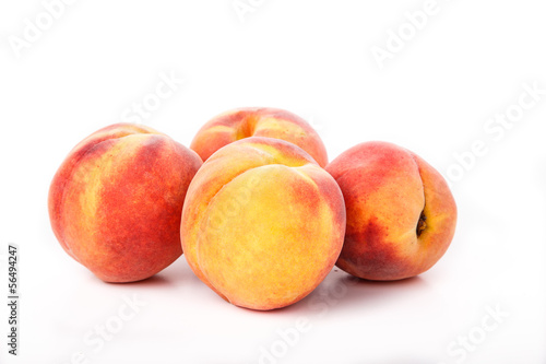 Four Peaches on White