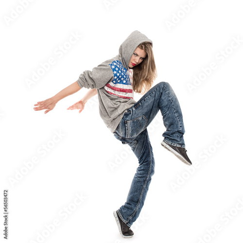 Canvas Print Beautiful active female hip hop dancer in hood moving in studio