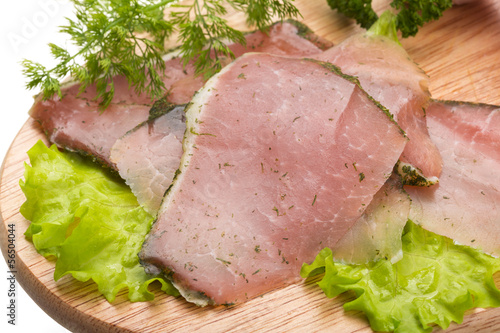 Ripe fresh ham with vegetables