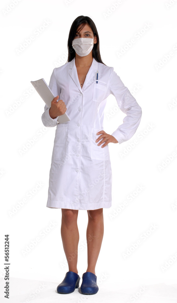 Joven mujer médico en fondo blanco.Odontólogo. Joven mujer médico en fondo blanco.Odontólogo.