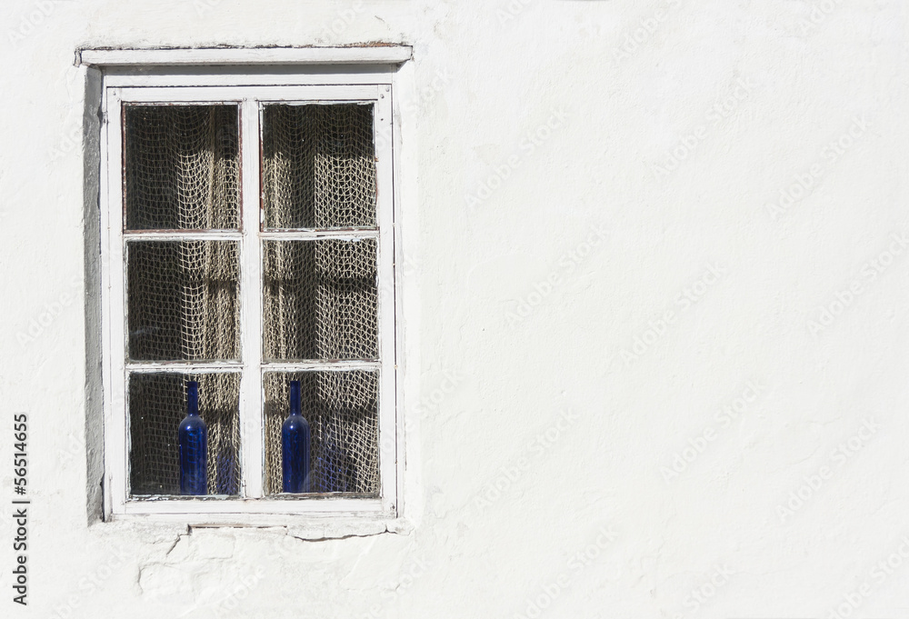 Window in white wall