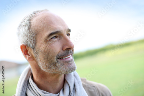 Portrait of smiling mature handsome guy