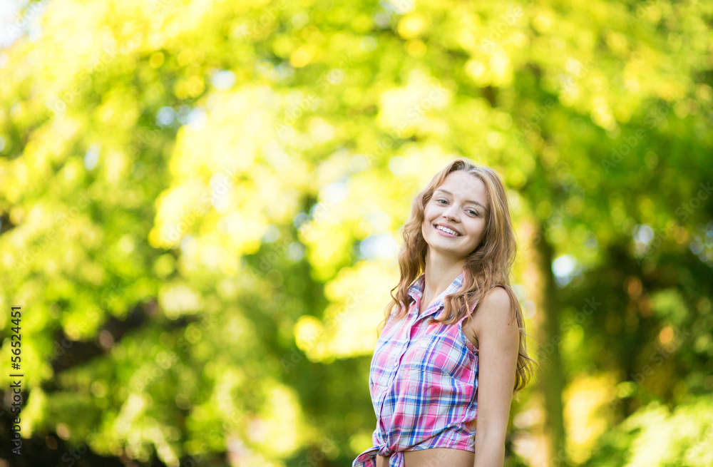 Happy young girl on a warm and sunny fall day Happy young girl on a warm and sunny fall day
