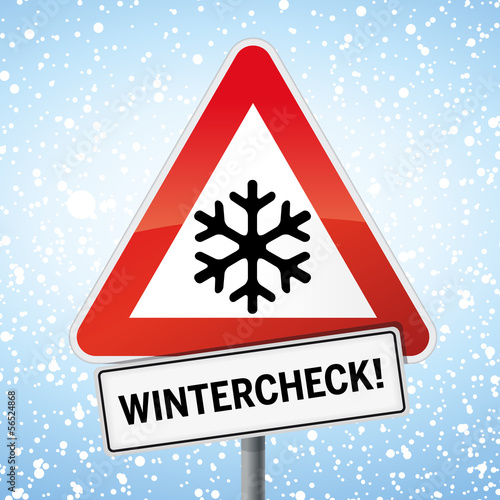 Schild Wintercheck mit Schneeflocke und Schnee