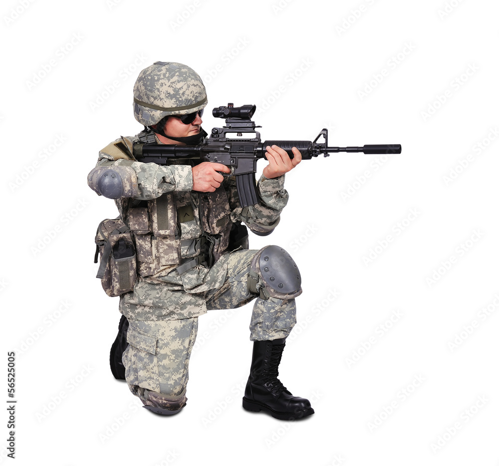 Fototapeta premium soldier adjusts his cap