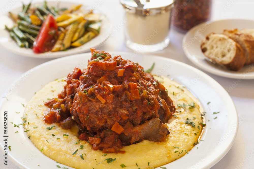 braised veal also called osso buco on polenta Stock Photo Adobe Stock
