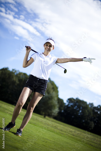 Girl playing golf 
