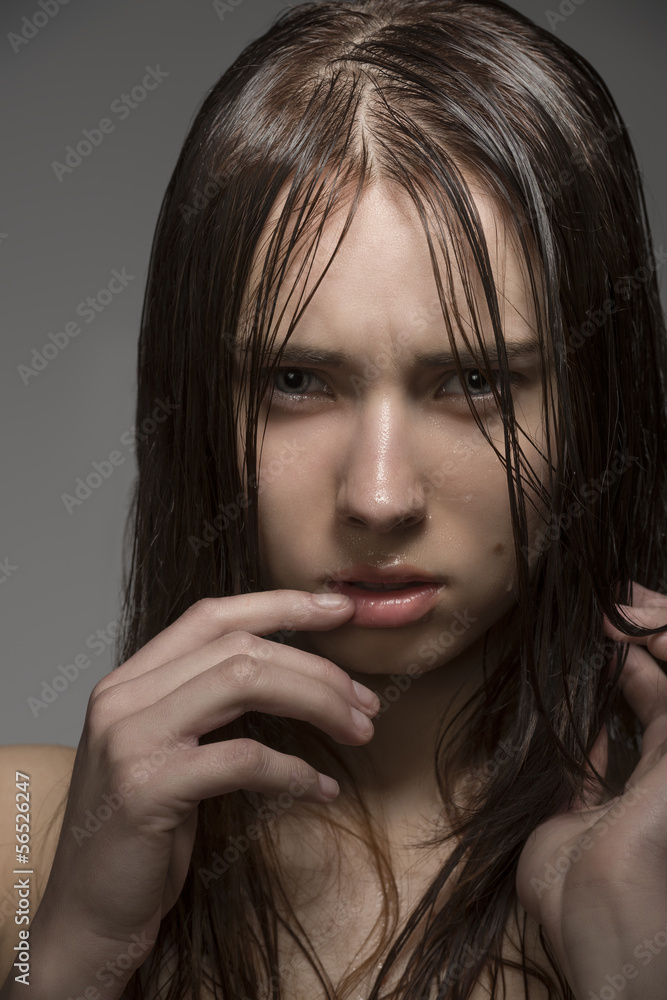 wet woman with angry expression wet woman with angry expression