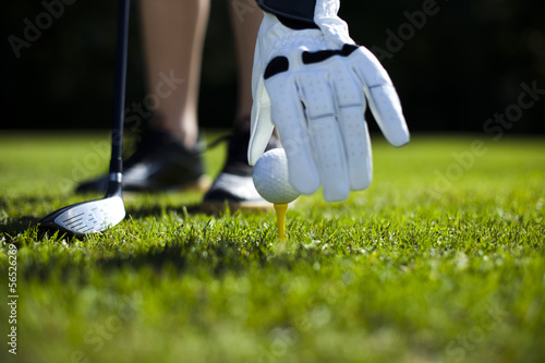 Hand and golf ball