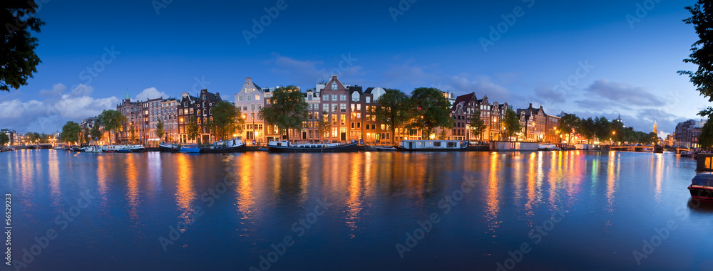 Naklejka premium Starry night, tranquil canal scene, Amsterdam, Holland