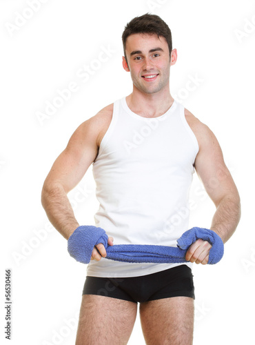 Healthy happy young man with towel isolated