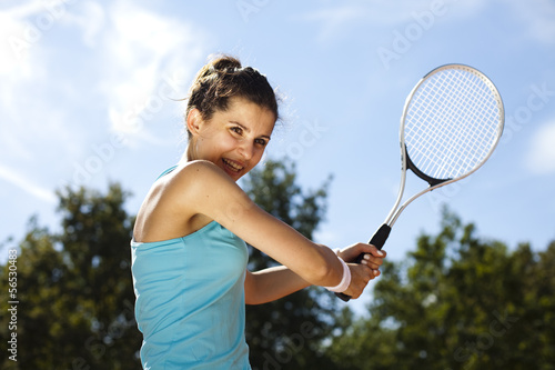 Playing tennis