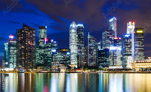 Singapore city skyline at night © leungchopan