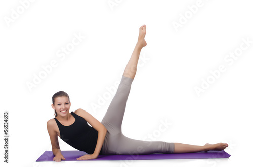 Young woman doing exercises on white