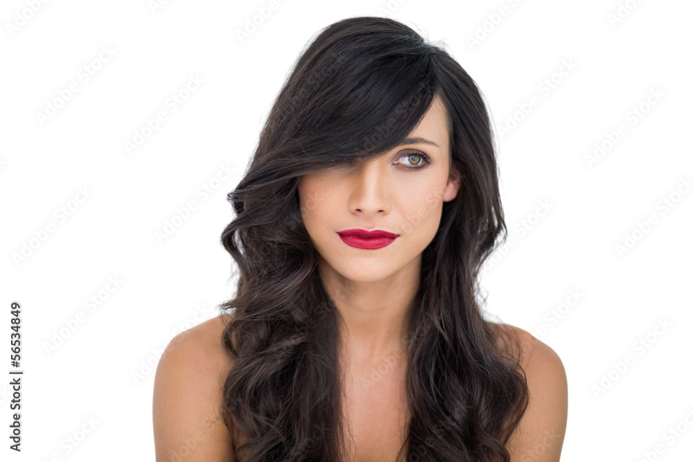 Pensive dark haired woman posing with red lips Pensive dark haired woman posing with red lips