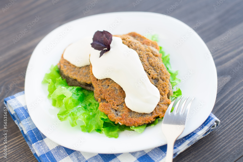 Potato pancake with sour cream