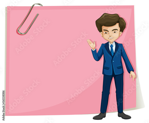 A businessman in front of the empty pink signage