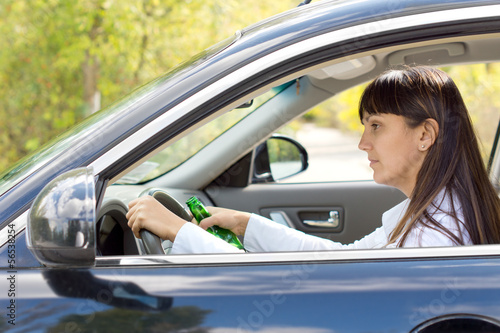 Drunk female driver with impaired ability © kolotype