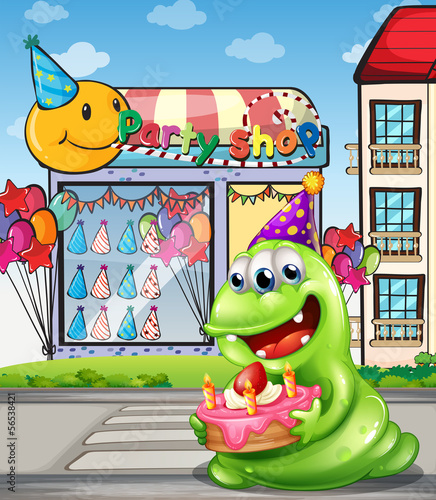 A monster with a cake standing at the pedestrian lane