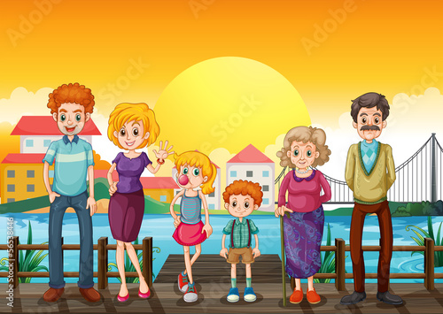 A family at the wooden bridge across the village