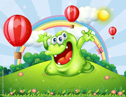 A hilltop with floating balloons and a green monster