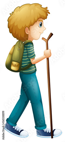 A boy hiking with a wood