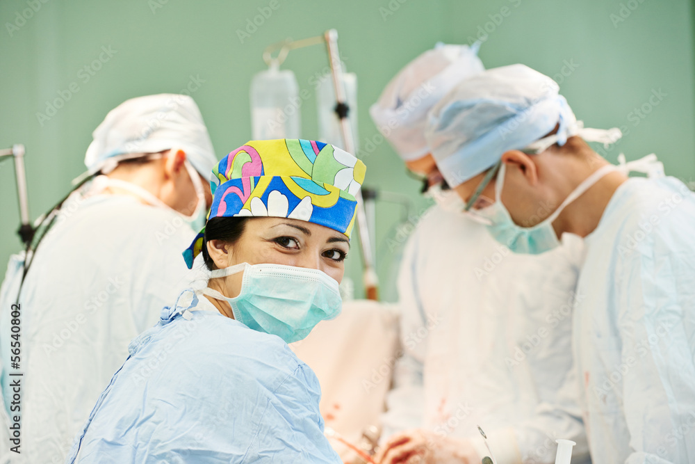 surgeons team at operation surgeons team at operation