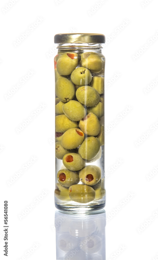 A lot of olives in a pile or glass pot A lot of olives in a pile or glass pot