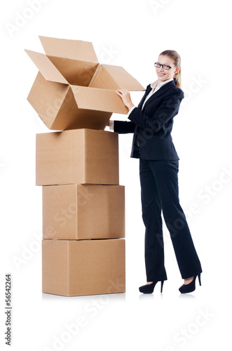 Businesswoman with boxes isolated on white © Elnur