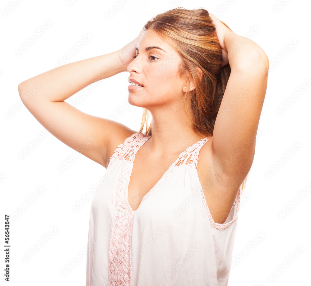 woman combing her hair on a white background woman combing her hair on a white background