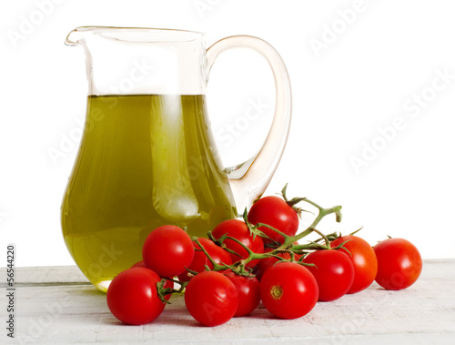 genuine olive oil and ciliegino tomato photo