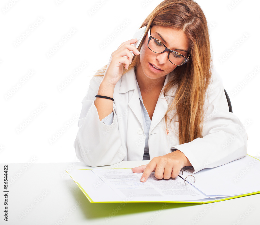 doctor speaking by phone on a white background