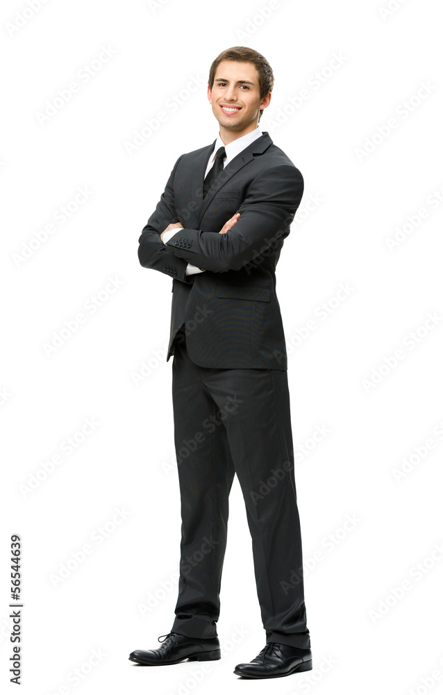 Full-length portrait of businessman with hands crossed Full-length portrait of businessman with hands crossed