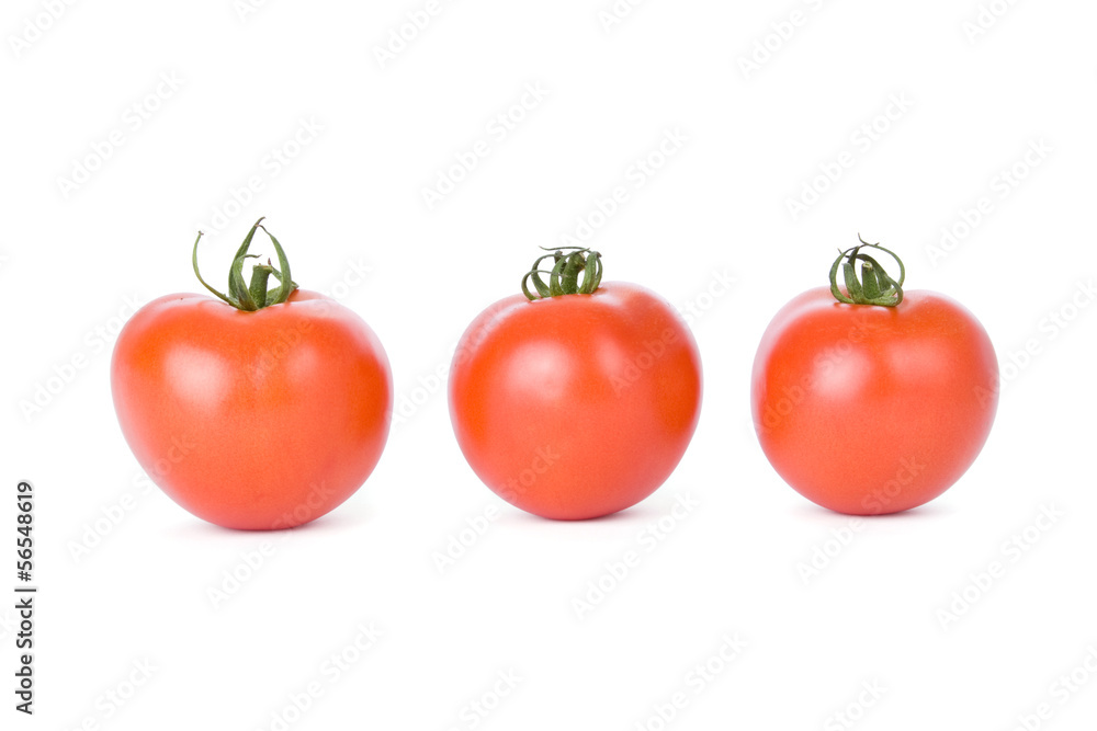 Ripe tomatoes isolated on a white background Ripe tomatoes isolated on a white background