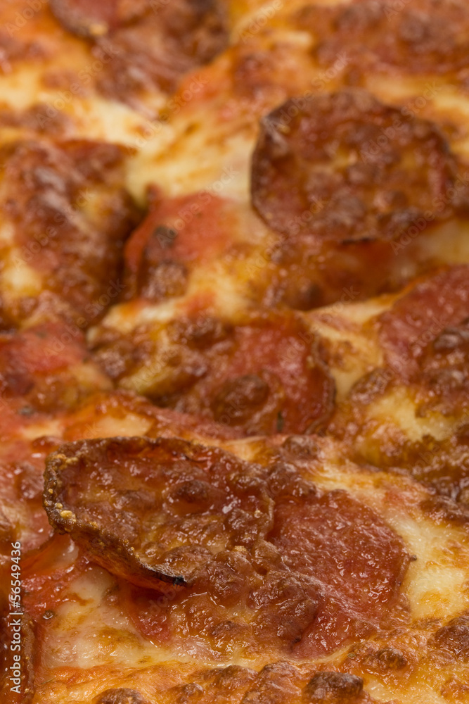 Close up detail of a pepperoni pizza Close up detail of a pepperoni pizza