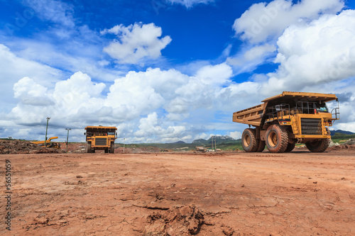 big truck in open pit and blue sky