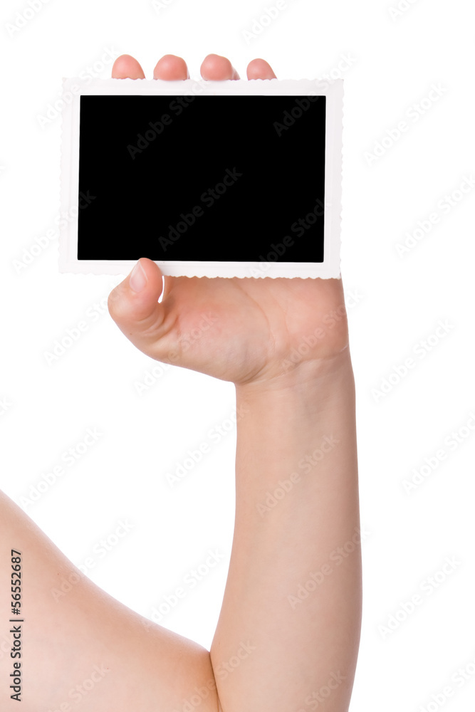 Hand holding a photograph isolated on a white background. Hand holding a photograph isolated on a white background.