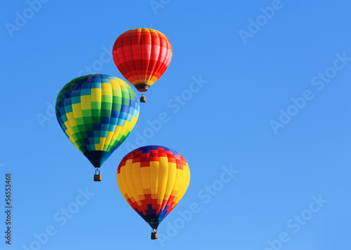 Canvas Print hot air balloons against blue sky