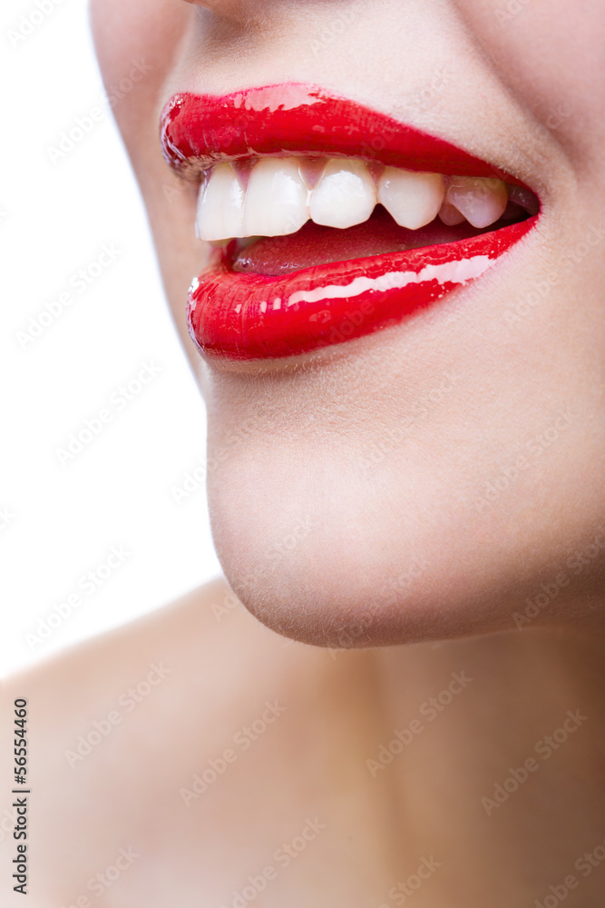 Fototapeta premium Close up of female red lips, isolated