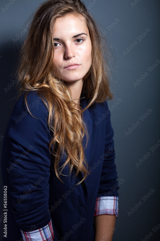 Portrait of sexy woman in jacket, dark background Portrait of sexy woman in jacket, dark background