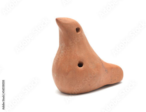 clay whistle on a white background
