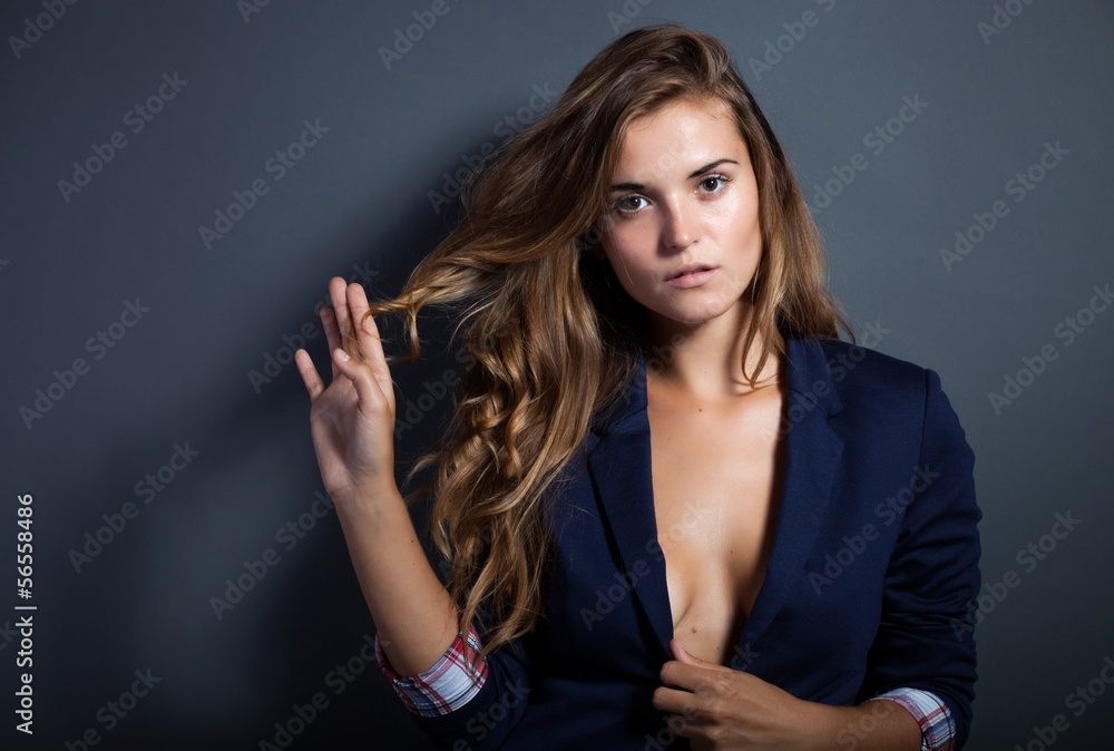 Sexy woman without bra in jacket foto de Stock | Adobe Stock
