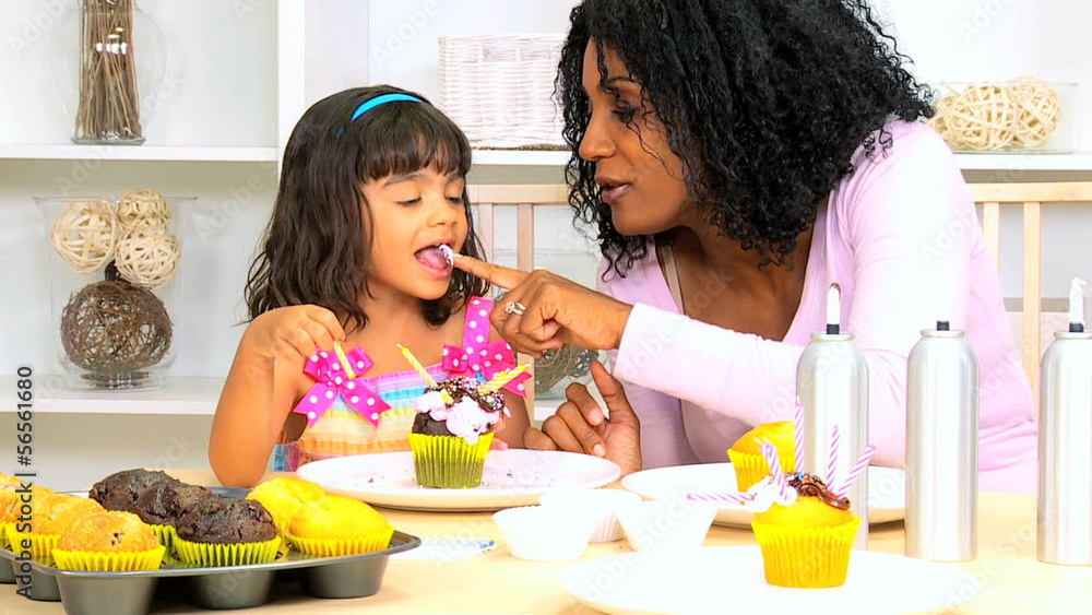 African American Mother Child Decorating Cupcakes African American Mother Child Decorating Cupcakes