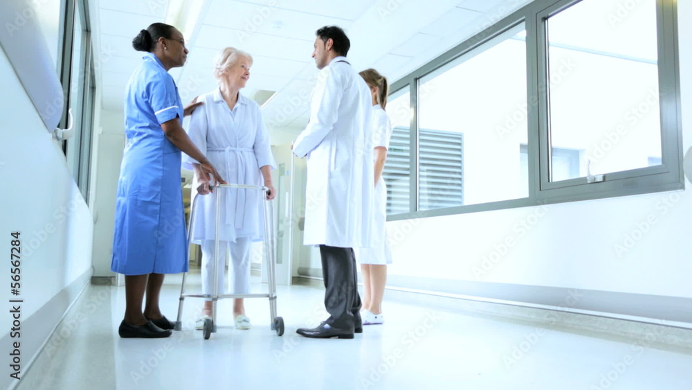Medical Staff Talking Senior Female Hospital Patient Medical Staff Talking Senior Female Hospital Patient